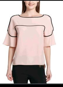 Calvin Klein Women's soft pink hue or light cream.