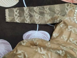 It's Beige color Gown.  I