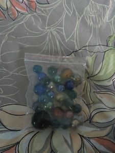 Bag of colorful glass marbles