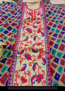 Embroidered suit with Floral Motifs
