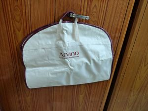 Chic Cream Handbag with Burgundy Trim