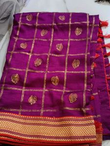 Vibrant Purple Saree with Gold Motifs