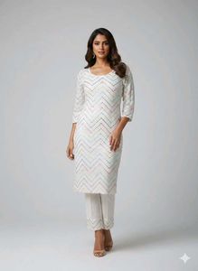 Elegant Embroidered Kurta Set with matching potly