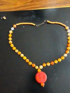 Vibrant Beaded Necklace with Red Pendant