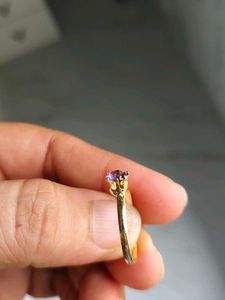 Elegant Gold Ring with Purple Stone