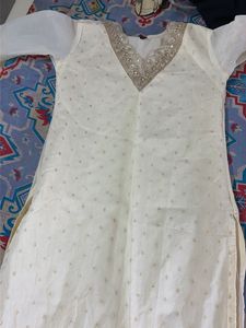 Elegant Cream Kurta with Embellished Neckline