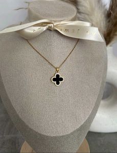white and black double side pendant