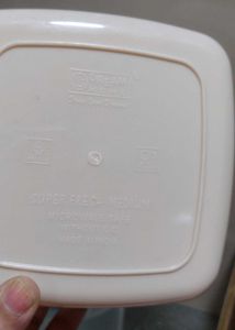 four Plastic Food Containers