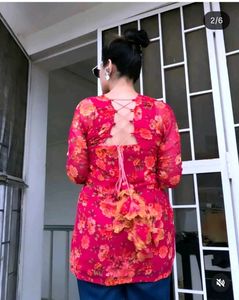 pink kurti with lining and lots of tussels