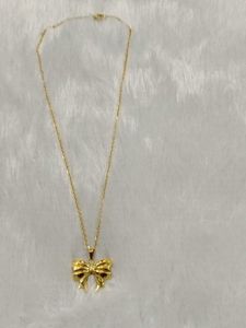 Gold Bow Pendant Necklace