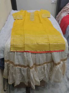 Elegant Yellow Kurta with Cream Skirt