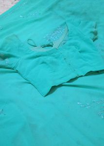 🩵Elegant Turquoise Saree with Embelli🩵shments
