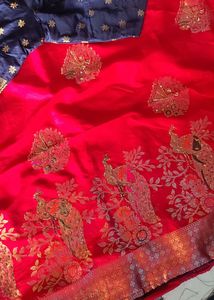 Vibrant Pink Saree with Peacock Motifs