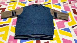 IT IS A Superman Varsity Jacket
