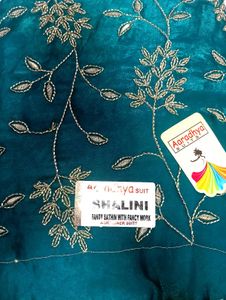 Amazing Torquiosh Green colour Suit Set