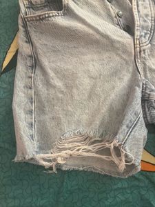 light washed distressed denim shorts