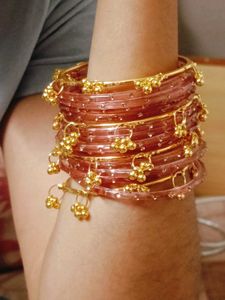 Elegant Glass Bangles with Golden Accents