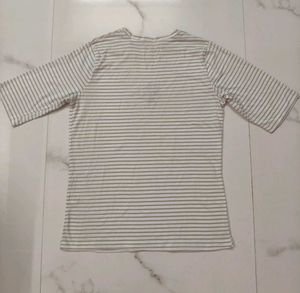 stripped off white top with thread embroidery