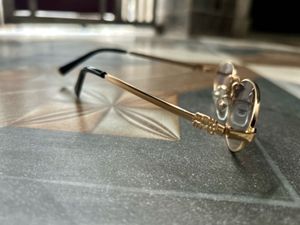 MiuMiu Style Gold Frame Sunglasses