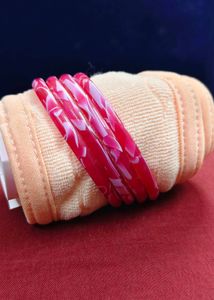 Vibrant Red Bangles with White Swirls