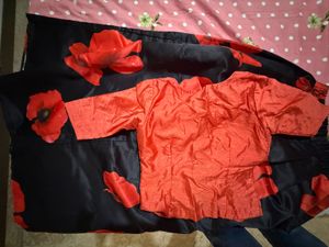 Stunning Orange &amp; Black Floral Lehenga Choli