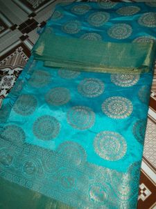 Stunning Teal Saree with Gold Brocade