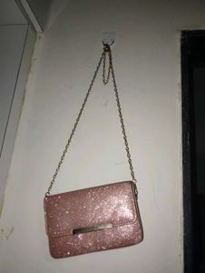 Rose gold sling bag