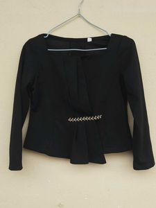 Elegant Black Peplum Top with Embellishments