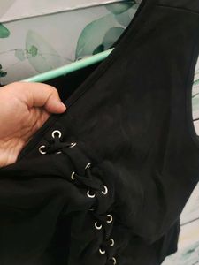 Sleek Black Lace-Up Sleeveless Top
