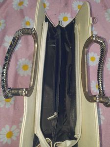 Chic Off-White Textured Handbag