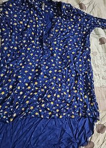 Its Navy Blue Top With White And Yellow Flowers