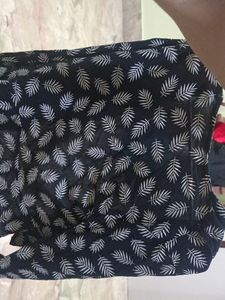 black shrug with leaf print