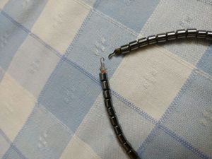 Gun metal neck piece