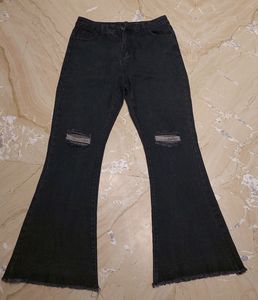 URBANIC HEAVY DISTRESSED BOOTCUT BLACK JEANS