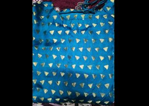 Elegant Teal Gown with Golden Print