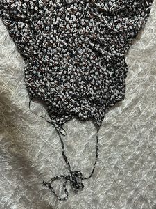 A Black Floral Jumpsuit