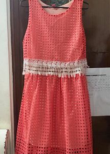 Chic Coral Lace Dress with Tassel Detail