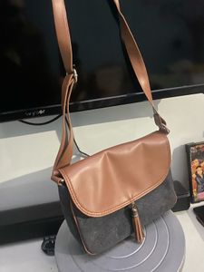 Stylish Crossbody Bag with Tassel Accent