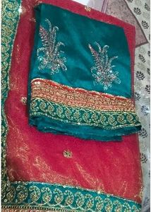 Stunning Red Embroidered Net Saree