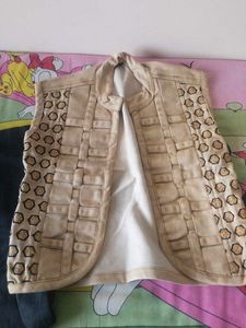 Stylish Black Jeans and cream vest