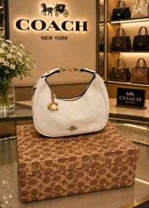 Coach Pink Signature Hobo Bag