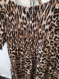 Chic Leopard Print Smocked Midi Dress