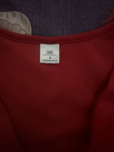 Red Sleeveless Top with Tie Details