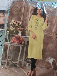 Elegant Yellow Kurta with Embellished Neckline
