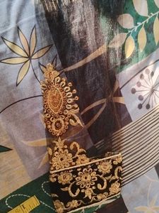 Elegant Black Blouse with Golden Embellishments