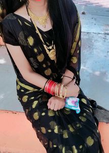 Elegant Black Saree with Gold Motifs
