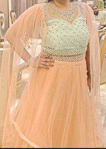 Elegant Peach Ethnic crop top and skirt
