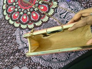 Elegant Peach Clutch with Gold Chain