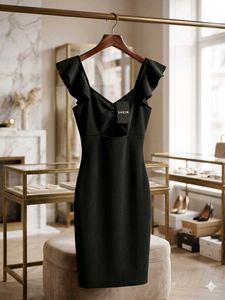 Chic Black Cut-Out Dress with Ruffle Sleeves