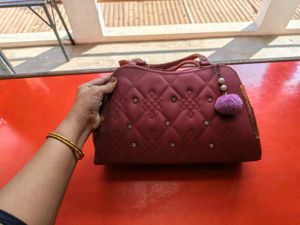 Quilted Handbag with Embellishments